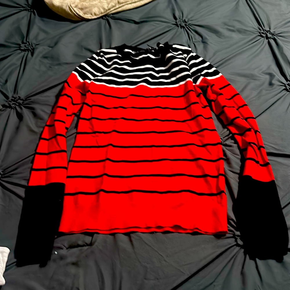Red, black and white sweater